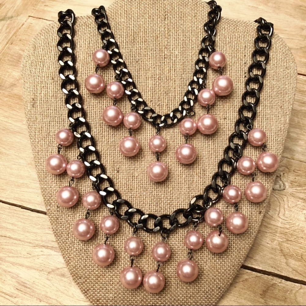Double strand double “pearl” drop necklace.